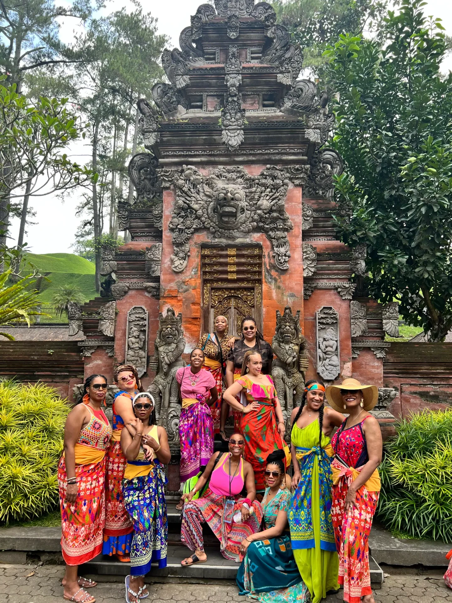 Escape with MJ Travel group at a Balinese temple in traditional sarongs
